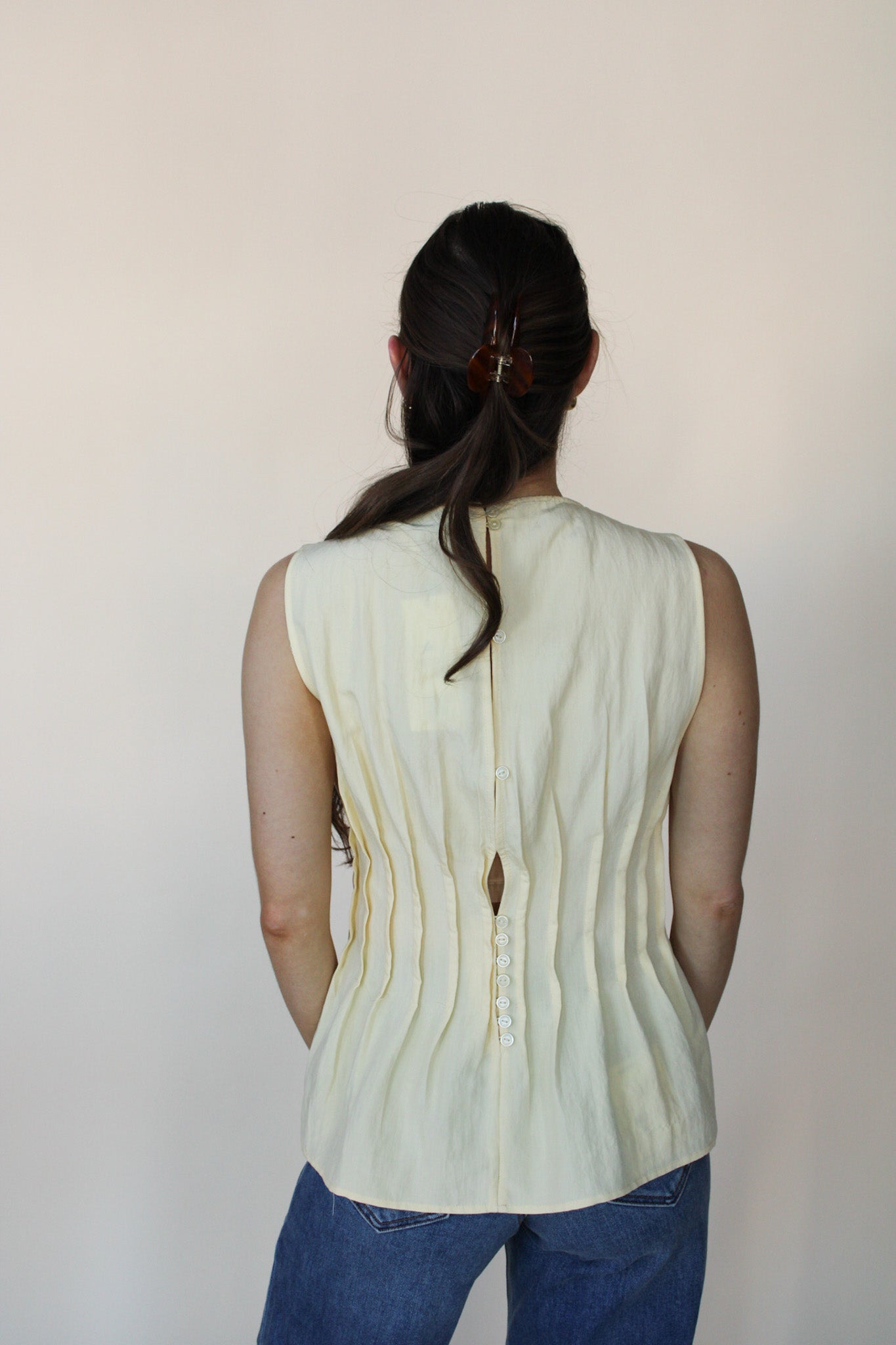 Pleated Peplum Sleeveless Top